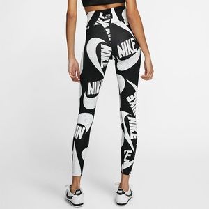 NIKE all over print leggings, size Medium